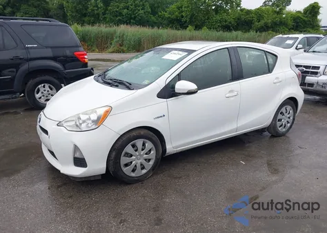 2013 Toyota Prius C Two from USA, damaged, VIN JTDKDTB36D1557050